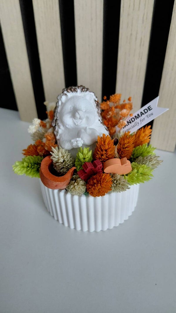 Herfstpotje gevuld met droogbloemen