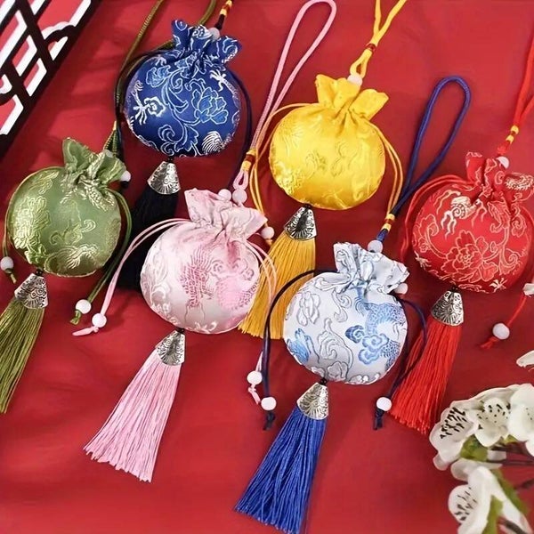 Traditionele zijden tasjes / Kado bij bestelling v.a. € 15,--.