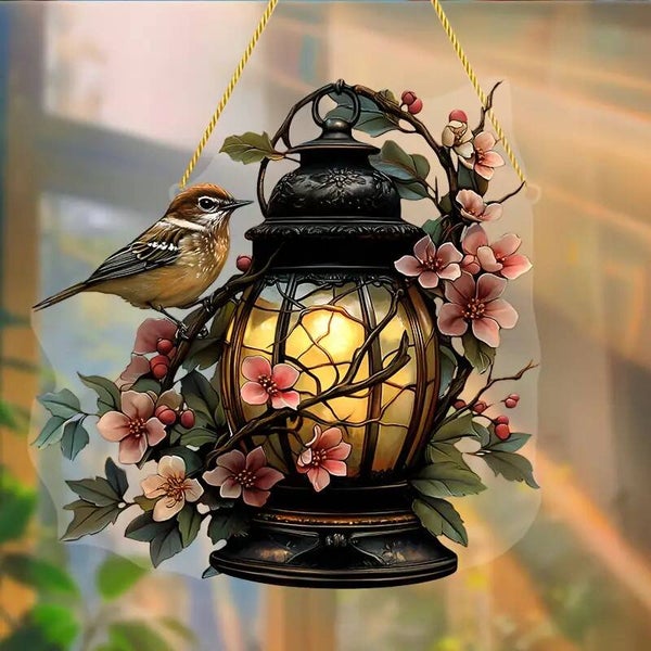Raamhanger vogel met lantaarn
