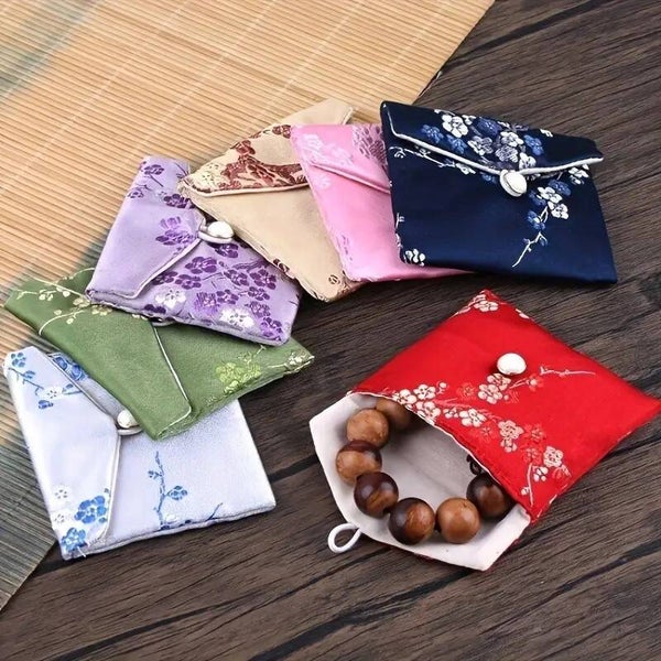 Zijden tasjes / Kado bij een bestelling boven € 10,--. Helaas deze tasjes zijn tijdelijk uitverkocht.!