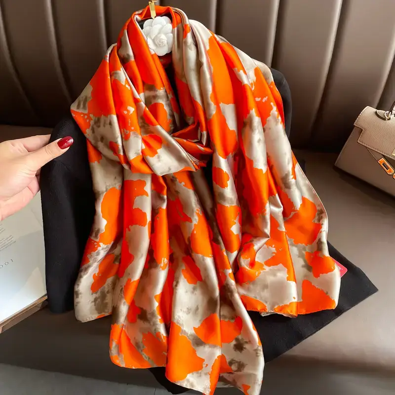 luxe omslagsjaal ecru met oranje retro stijl