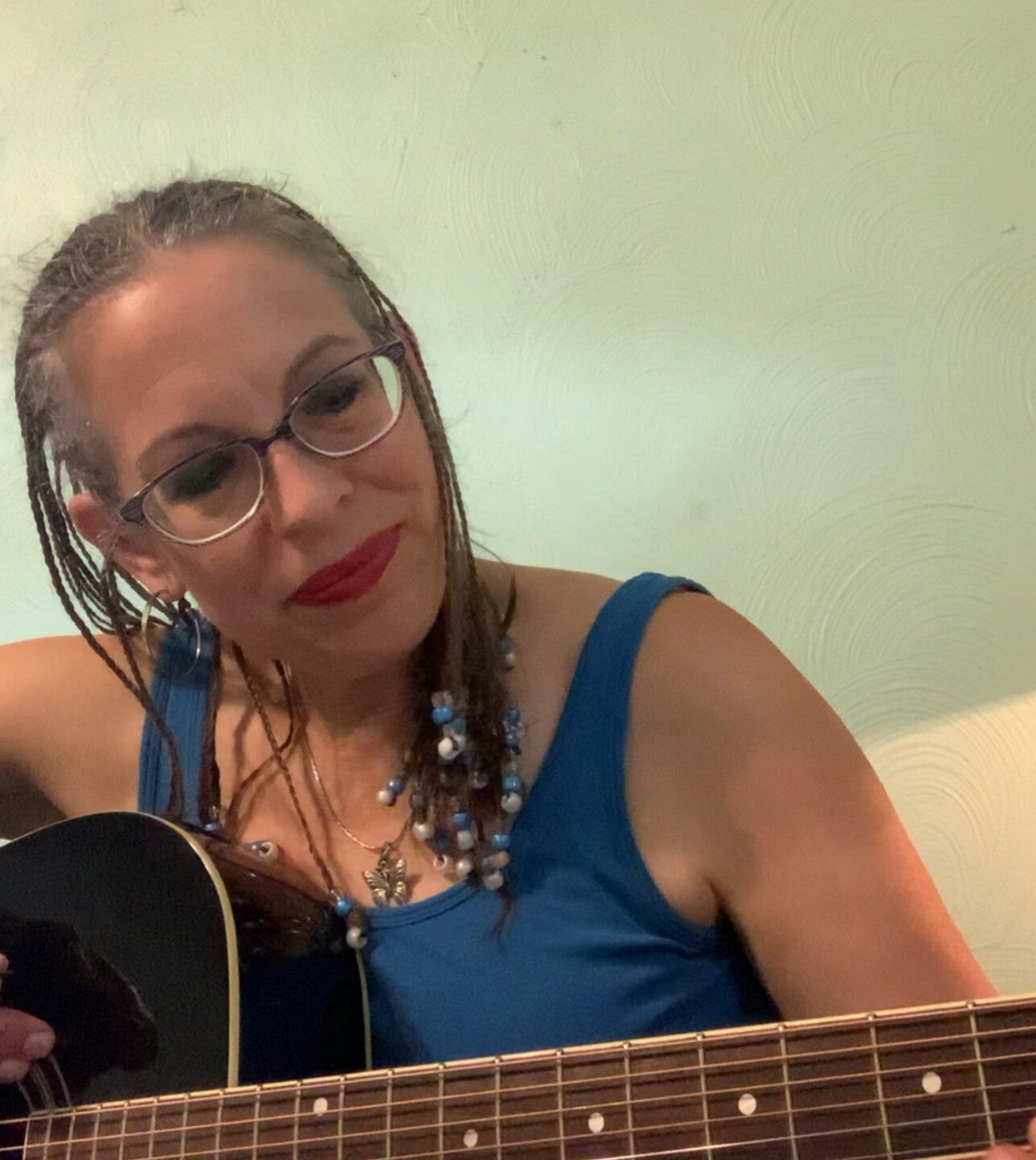 LJ Brandt and her black guitar