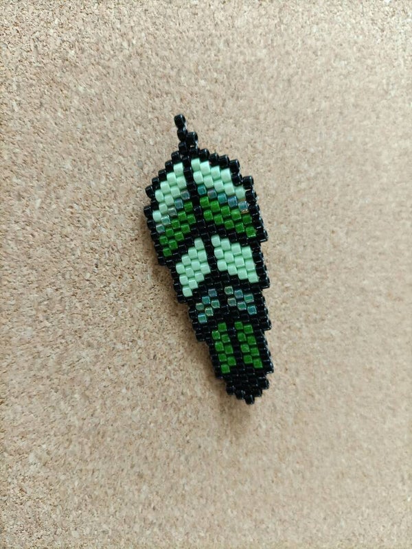 Pin's Plume P8