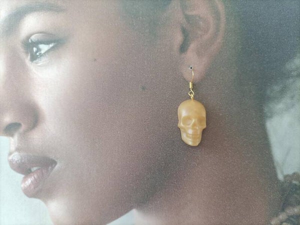 Boucles d'oreilles pendantes Tête de mort doré BO22G