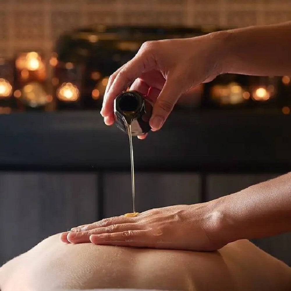 Masaje antiestrés con aceites esenciales para relajación profunda y bienestar