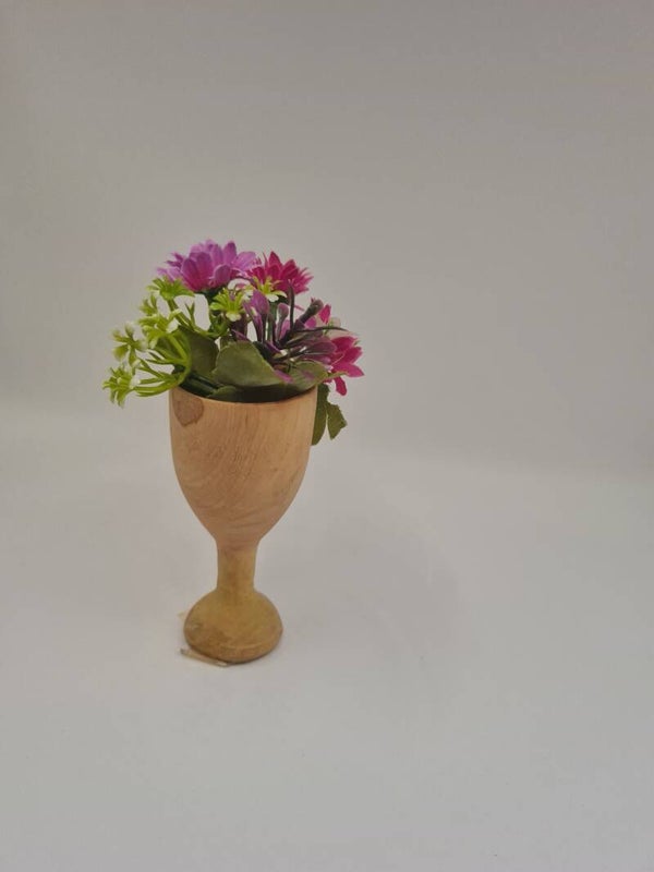 Kelkje met kustbloemen