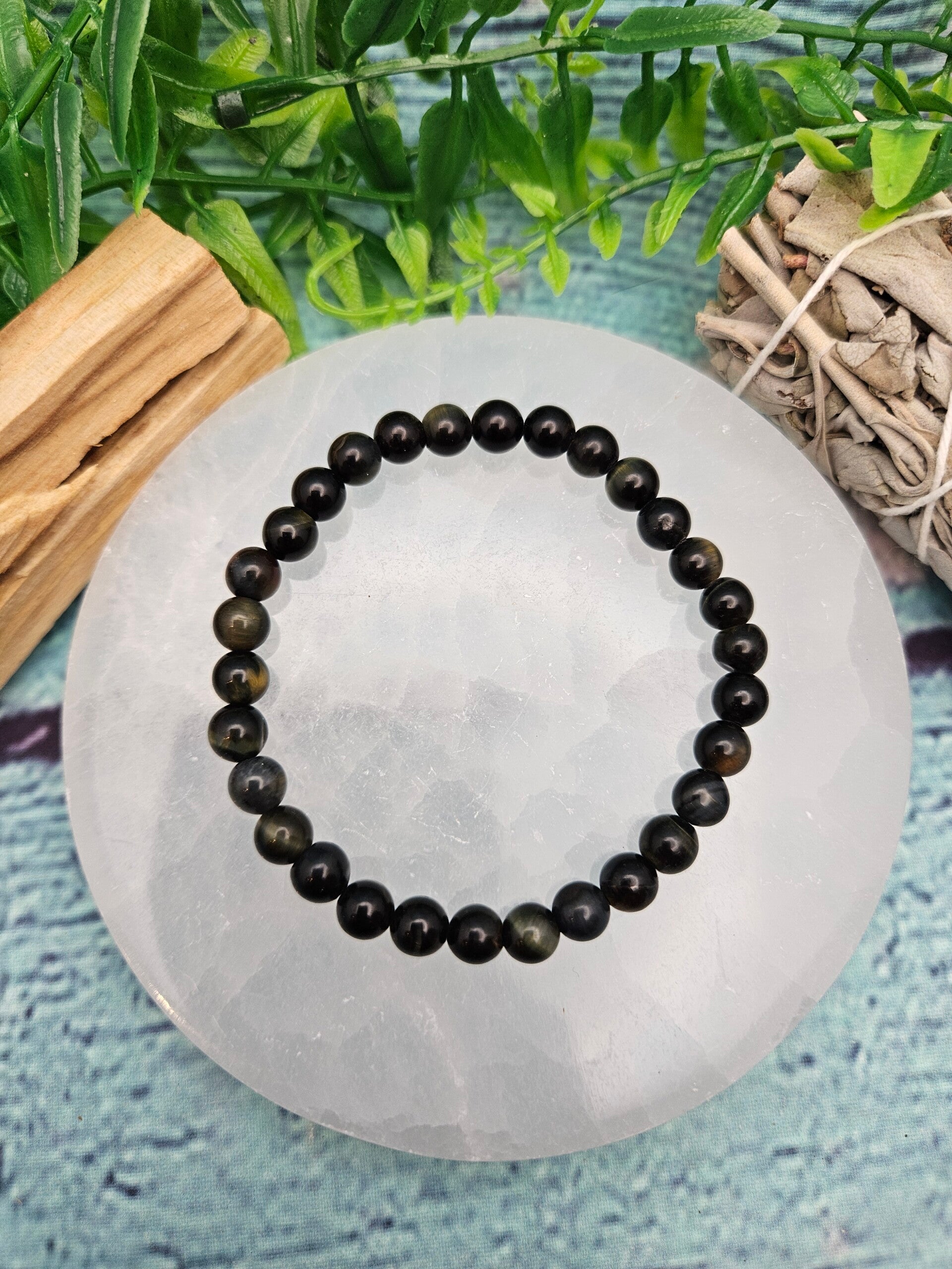 Bracelet boule 6 mm œil de faucon