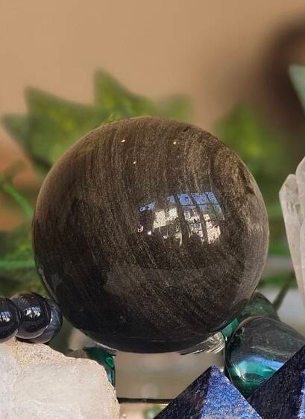 Sphère obsidienne dorée