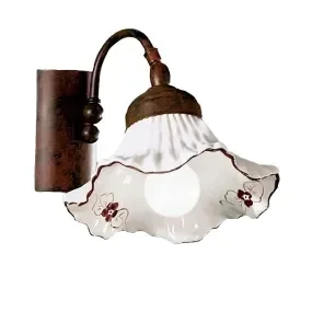 Applique metallo finitura ruggine Sorgente ceramica smerlata decorata a mano