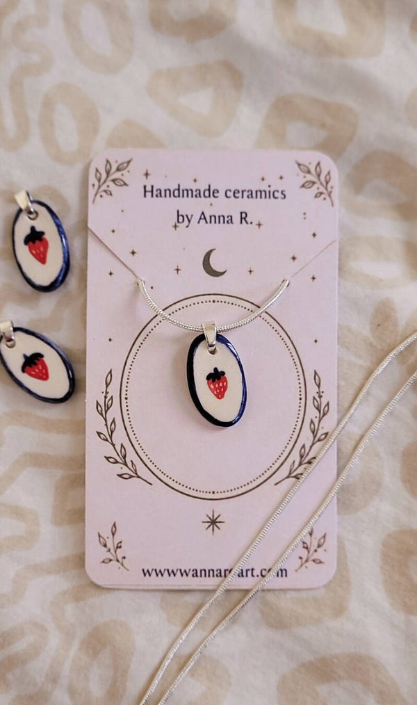 Strawberry ceramic pendant on silver chain