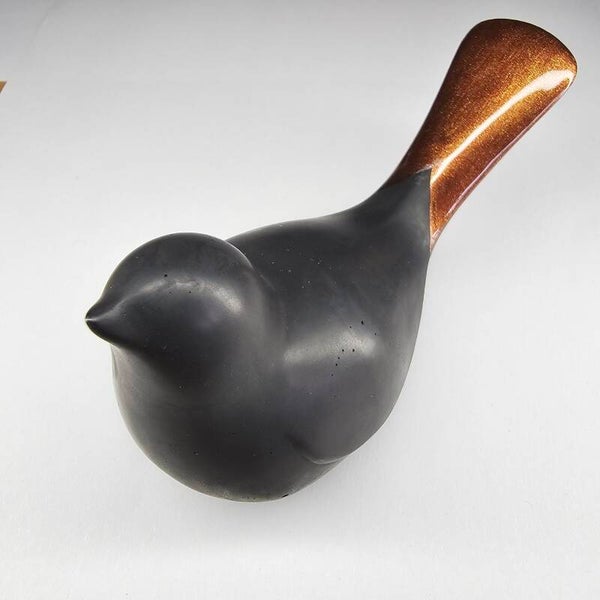 Més'ange bronze