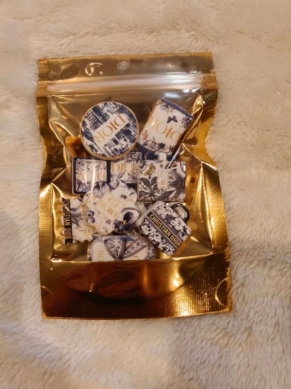 Goud met blauwe kralen