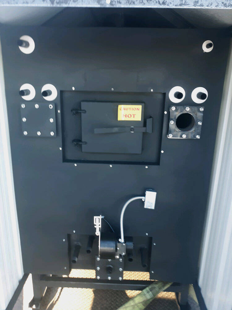 Legend Outdoof Furnace, wood stove, boiler back with door open