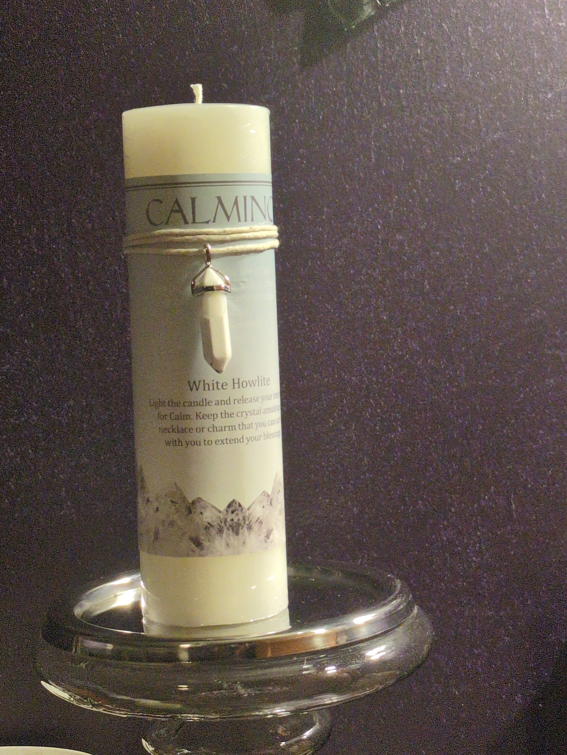 Crystal Journey Candles Calming Pillar Candle with a White Howlite pendant.