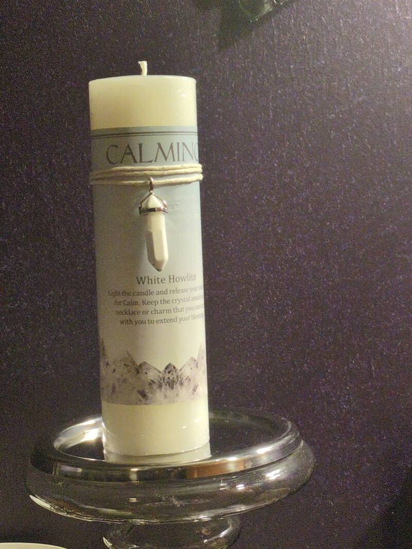 Crystal Journey Candles Calming Pillar Candle with a White Howlite pendant.