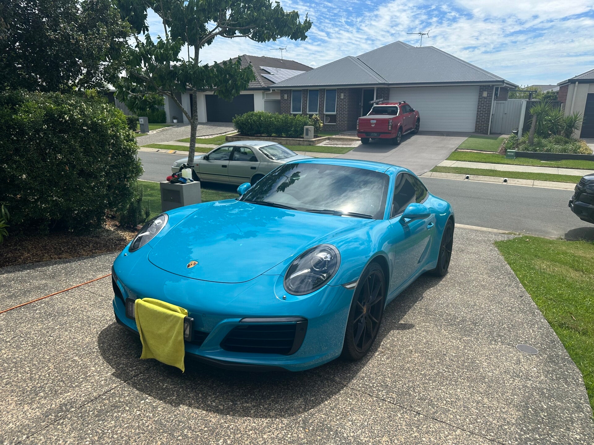 Professional car detailing North Lakes - shiny exterior reflecting sunlight