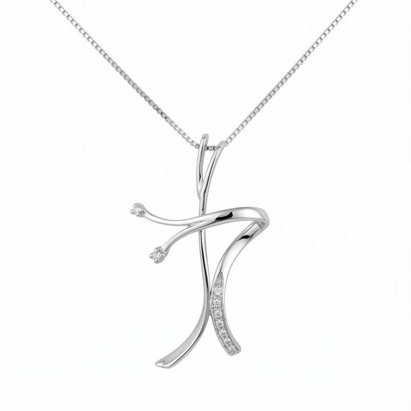 Croce in oro bianco e diamanti