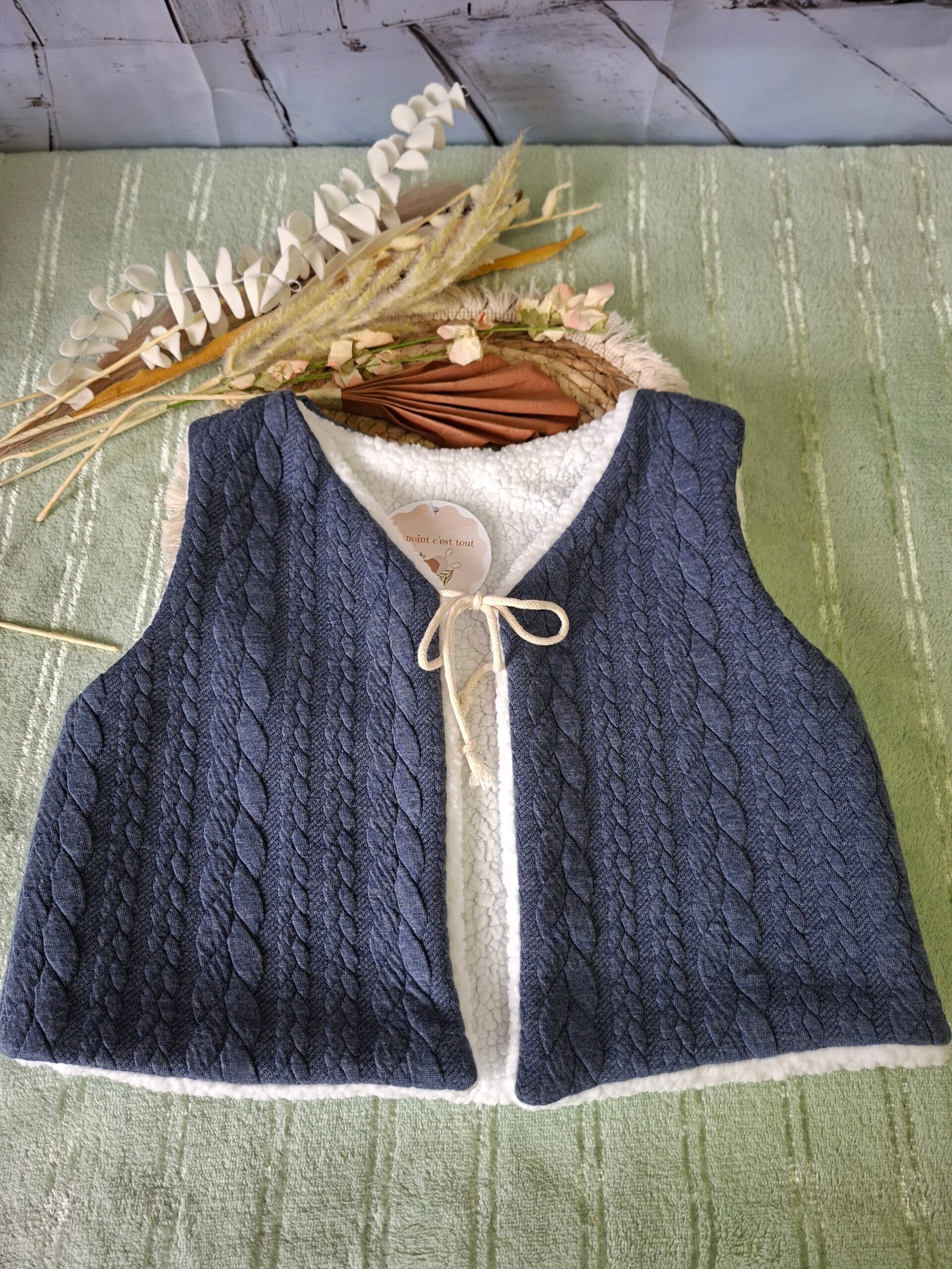 Gilet réversible torsadé bleu