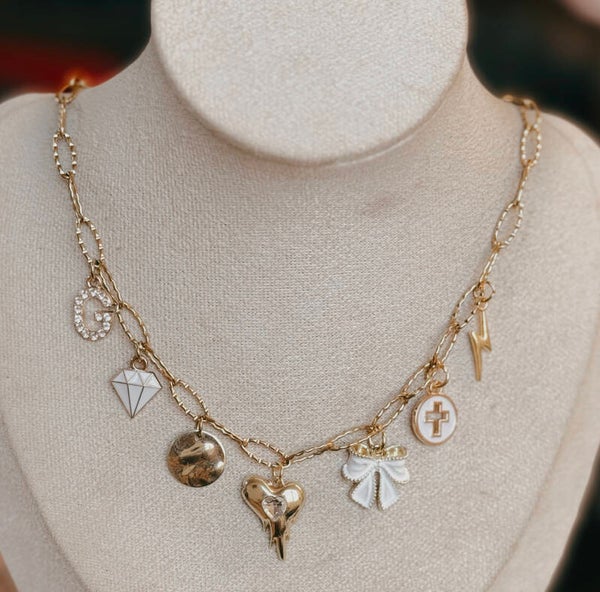 Charm white and gold necklace