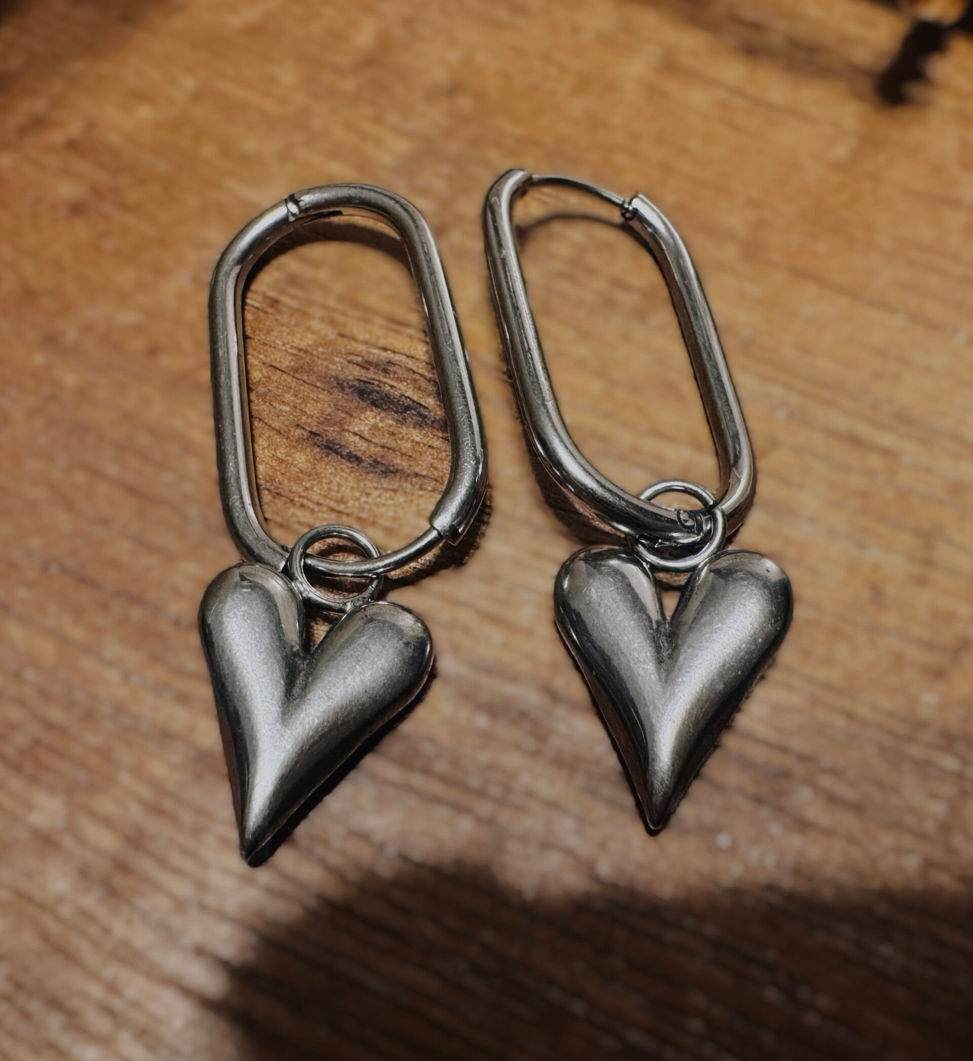 Silver heart charm earrings