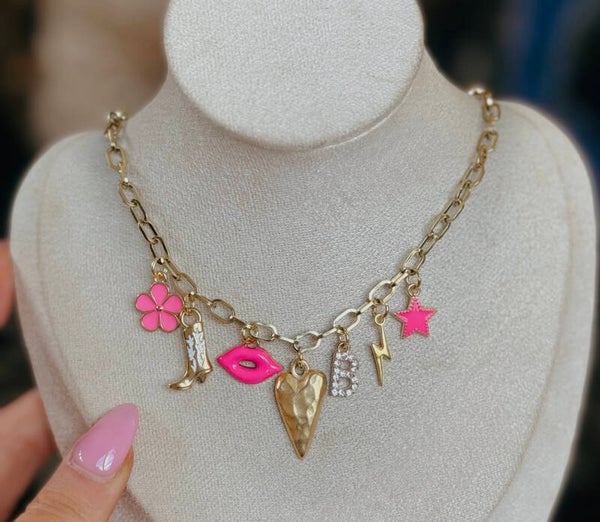 Gold and hot pink charm necklace