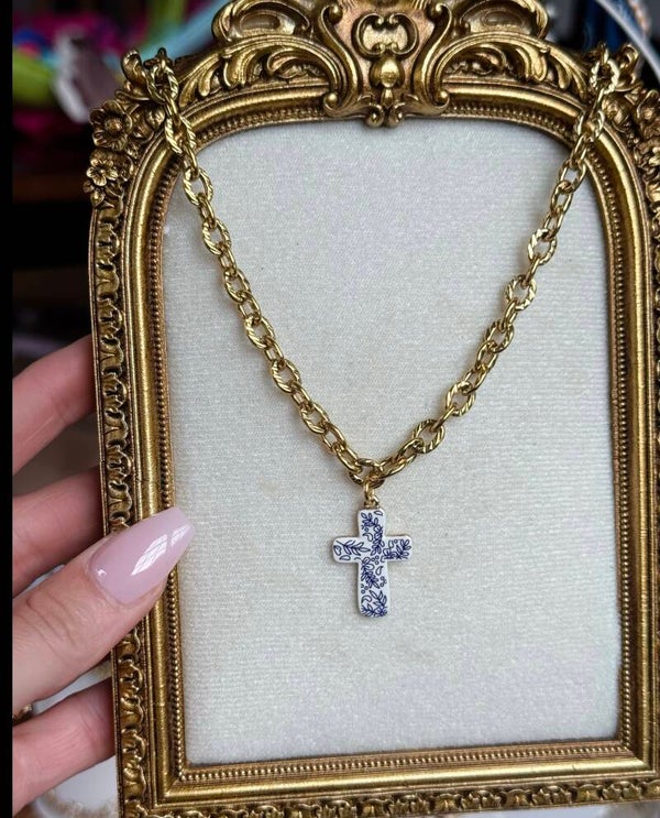 Blue and white cross necklace