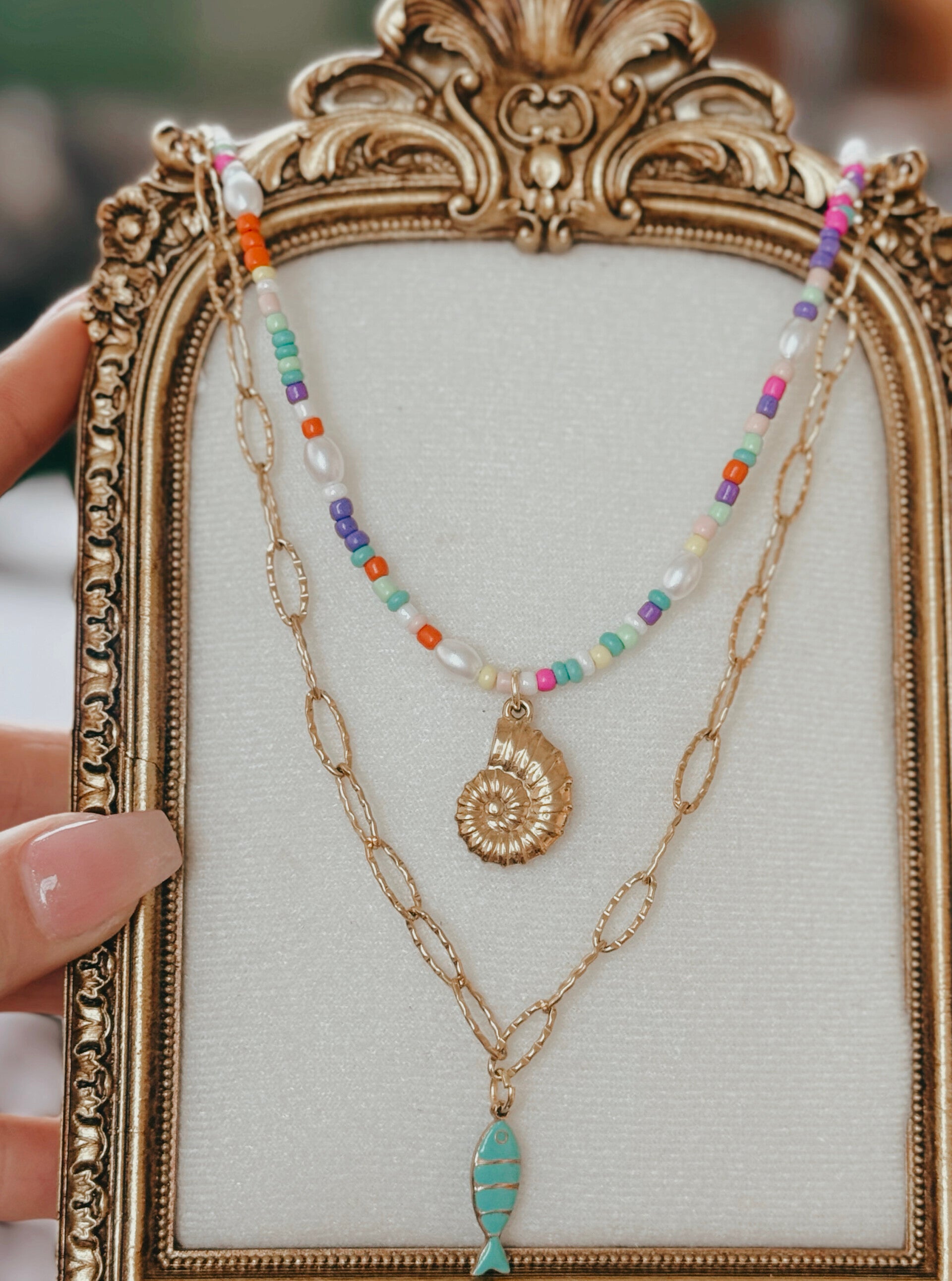 Seashell and fish set necklace