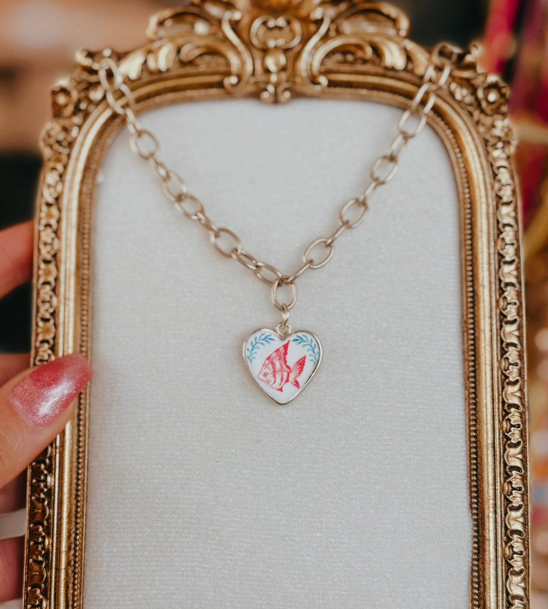 Fish charm necklace