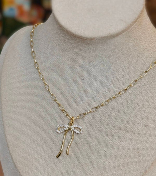 Gold and diamond bow necklace