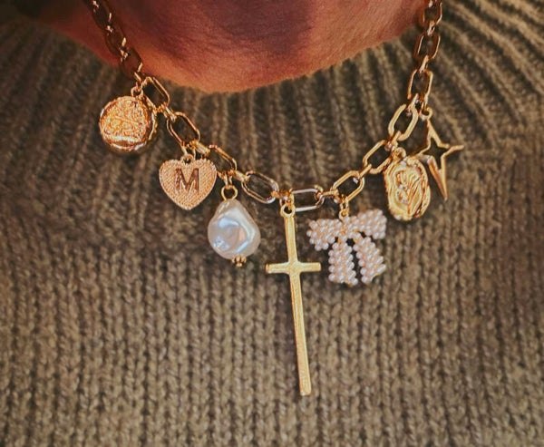 Long cross charm necklace