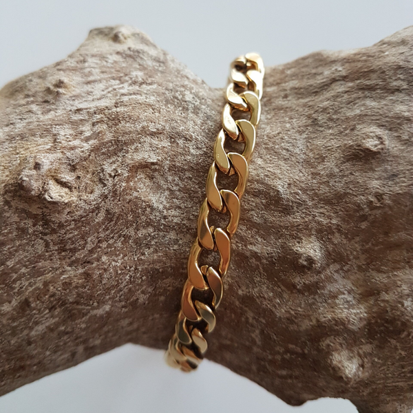 Grove schakelarmband in verguld roestvrij staal, breedte 7mm.