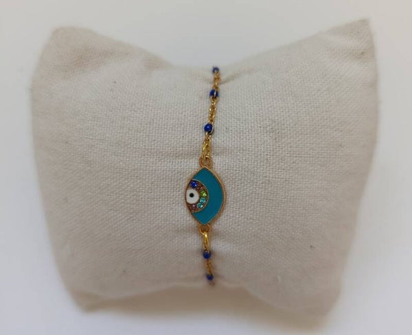 PE-BRCH-REF11002-(11.00€)-Un Bracelet Chaine Doré Perle Bleu -  Breloque centrale Yeux Cyan-  Strass