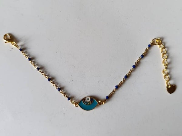 PD-BRCH-REF11002-(11.00€)-Un Bracelet Chaine Doré Perle Bleu -  Breloque centrale Yeux Cyan-  Strass