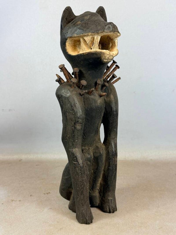 260528 - African Fetisch Bakongo Nkisi Nkondi sitting dog - glass eyes - Congo.