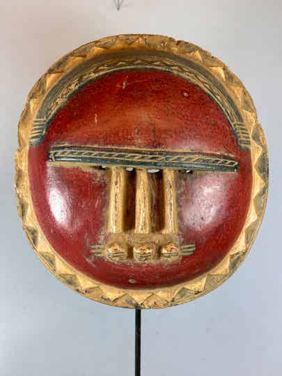 250934 - African Red round Baule mask - Iv. Coast.