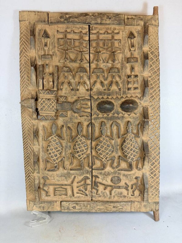 260999 - African carved Dogon door from a Granary - Mali.