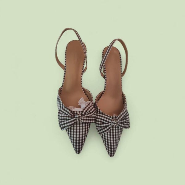Brown and White small square ladies shoe with straps and a gentile pointed toe