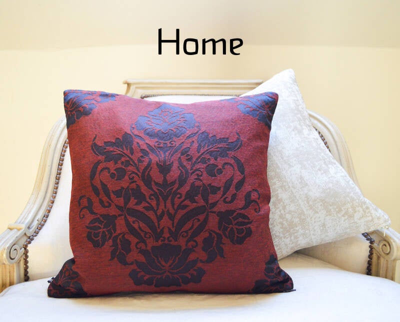CUSTOM HOME button; picture shows a burgundy cushion with 19th century-style pattern in a chique white chair