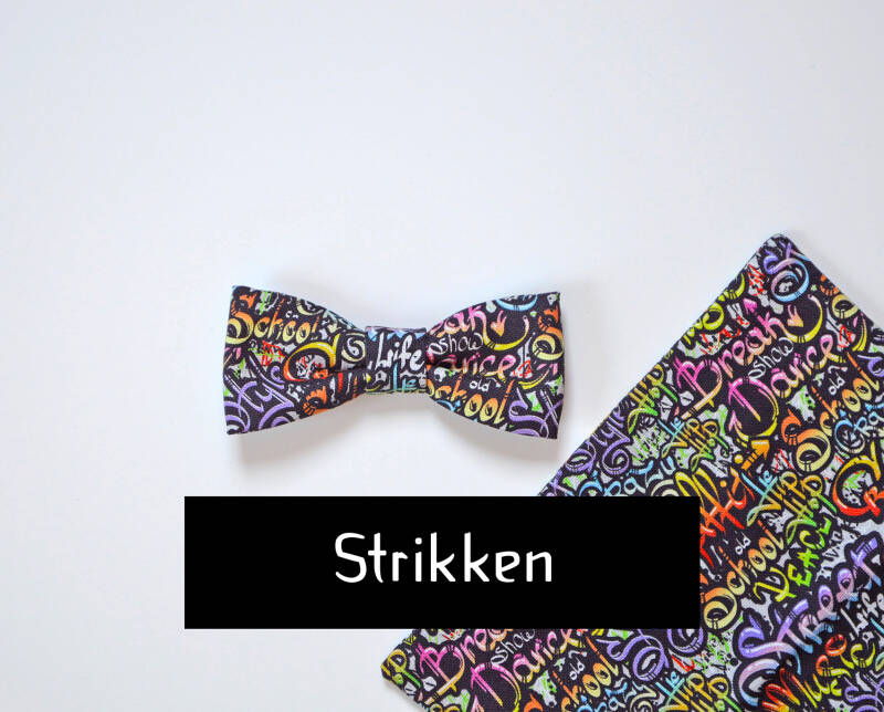 STRIKKEN button; afbeelding toont een strik en pochet met kleurrijke graffiti print