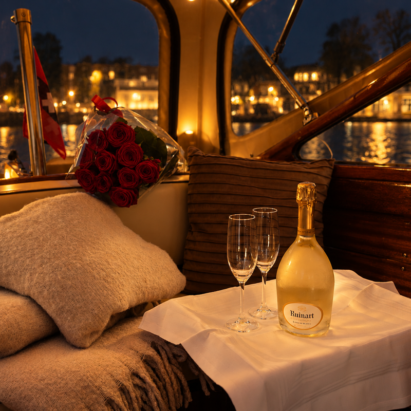 Roses and champagne on a table for two aboard Venice