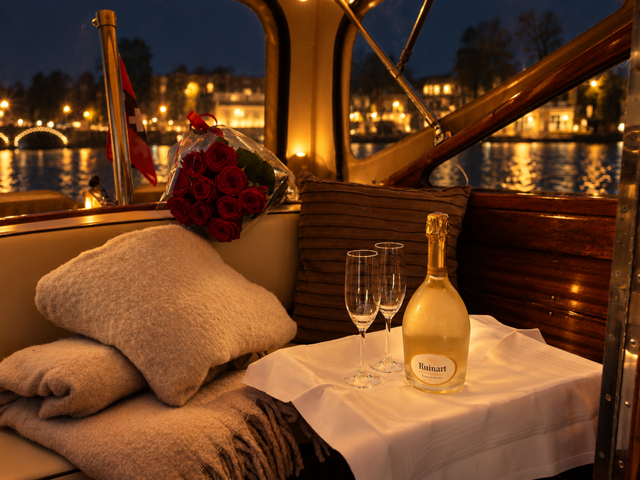 A table for two with roses and champagne aboard Venice