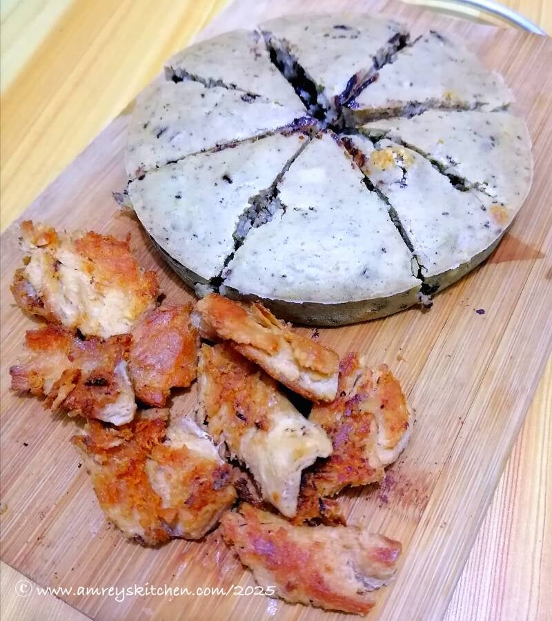 Air-Fried Vegan Dark Chocolate and Raisins Pancake on a wooden board, sliced with vegan tocino. Recipe and photo by Amrey Boquiren for Amrey’s Kitchen™.