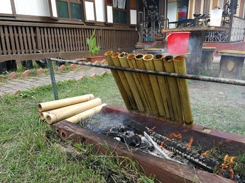 sticky rice in bamboo over charcoal photo by Amrey Boquiren of Amrey's Kitchen. Malaysia 2019.