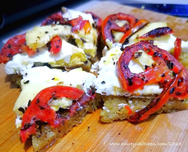 Vegetarian Tomato and Egg Rice Pie on a wooden board. Recipe and photo by Amrey Boquiren for Amrey’s Kitchen™.