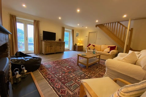 The Creamery lounge with stone fireplace