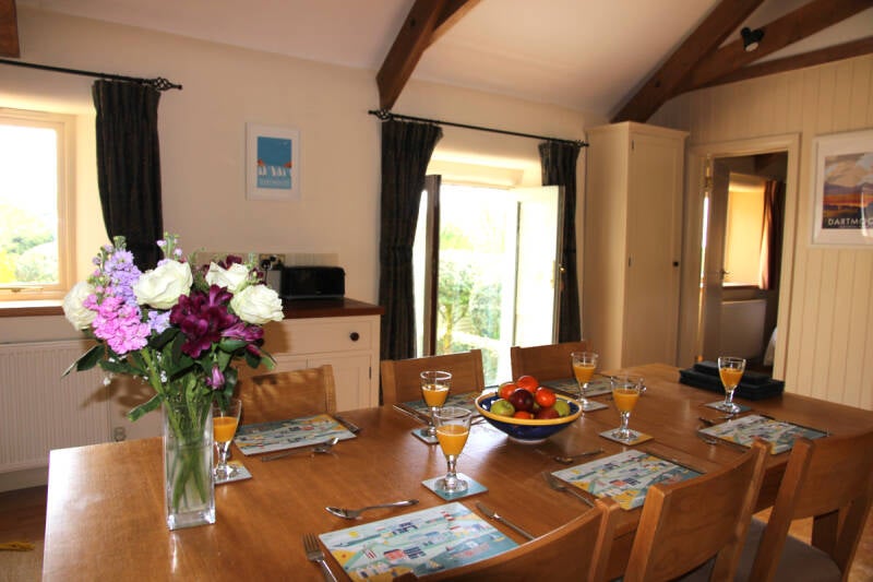 Holiday home kitchen with garden and distant sea views