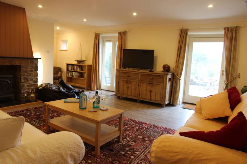 holiday home lounge with stone fireplace