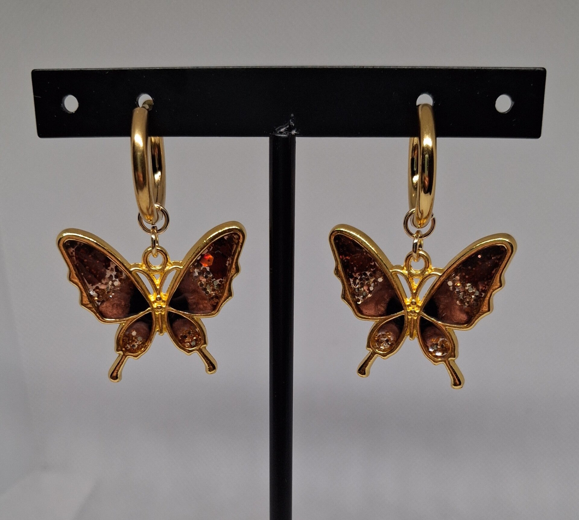 Oorringen met vlinder