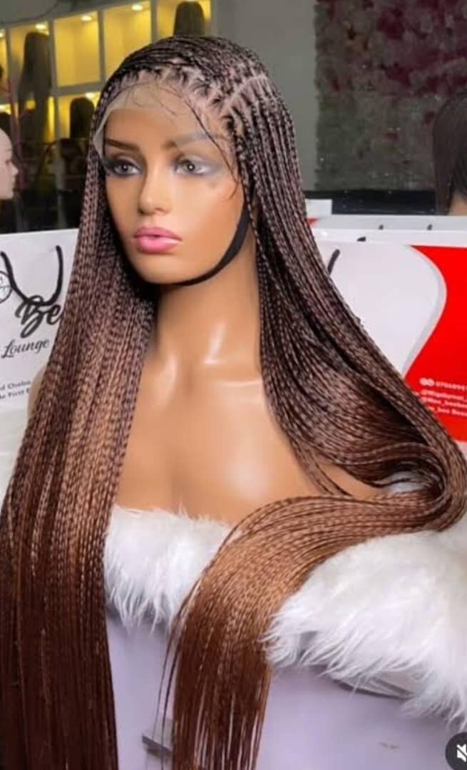 Braided wig made with bone straight attachment.