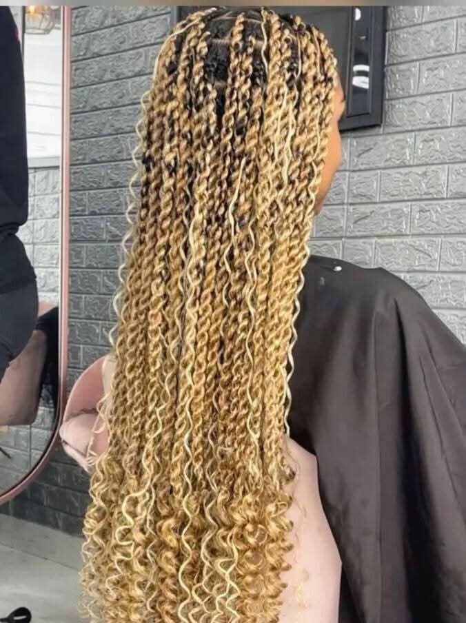 Box cutting twisting braids end with curls